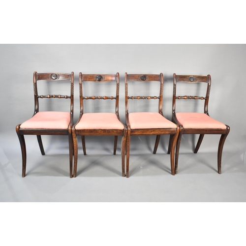 235 - A Set of Four Bar Back Dining Chairs