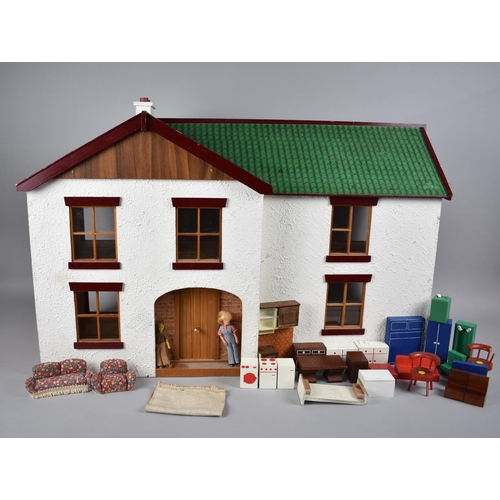 242 - A Late 20th Century Dolls House with Small Collection of Furniture, 76cms Wide and 48cms High