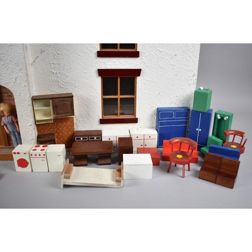 242 - A Late 20th Century Dolls House with Small Collection of Furniture, 76cms Wide and 48cms High