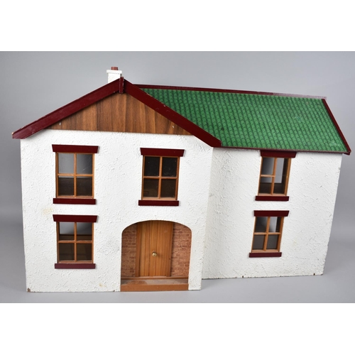 242 - A Late 20th Century Dolls House with Small Collection of Furniture, 76cms Wide and 48cms High