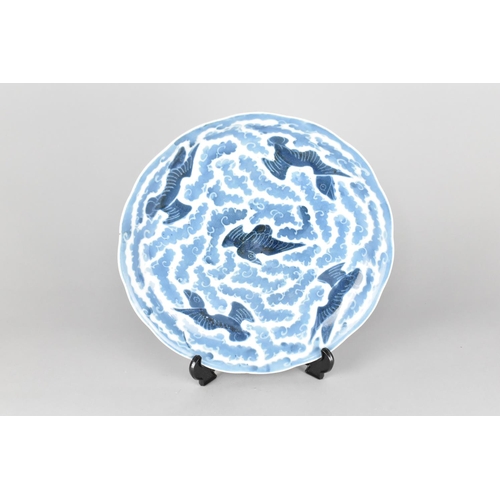 246 - A Oriental Porcelain Blue and White Plate with Wavy Rim Decorated with Birds in Flight Amongst Cloud... 