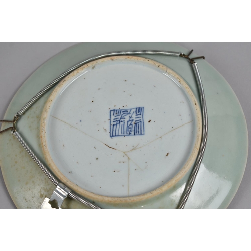 251 - A Chinese Qing Period Celadon Glazed Plate Decorated in the Famille Rose Palette with Butterflies an... 