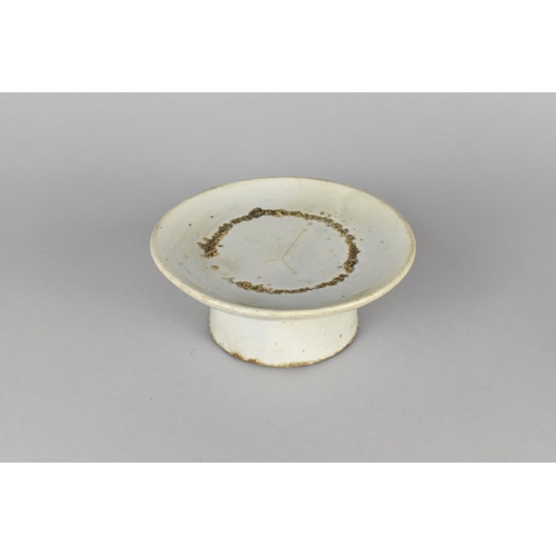 254 - An Early Chinese Celadon Pedestal Dish, 15cm Diameter