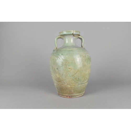 257 - A Chinese Ming/Qing Dynasty Jun Ware Glazed Twin Handled Vase Body Decorated in Shallow Relief Lotus... 