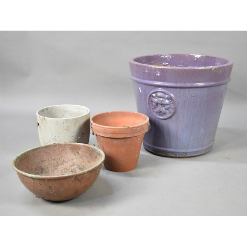 485 - A Purple Glazed Terracotta Patio Planter, 38.5cms Diameter together with Various Smaller Examples