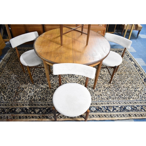 491 - A G-Plan Extending Oval Dining Table and Four Chairs