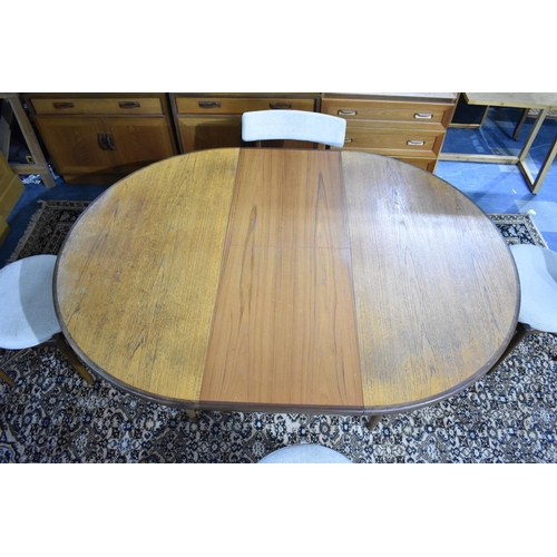 491 - A G-Plan Extending Oval Dining Table and Four Chairs