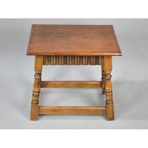 64 - A Mid 20th Century Oak Rectangular Stool, 45cms by 32cms