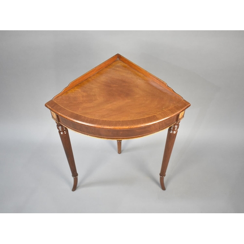 72 - A Reproduction Edwardian Mahogany Galleried Corner Bow Fronted Table with Tapering Reeded Supports, ... 