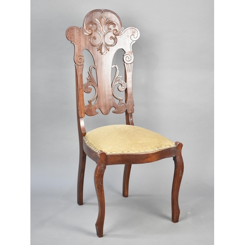 75 - A Continental Side Chair with Pierced and Moulded Back, Serpentine Front and Cabriole Front Legs