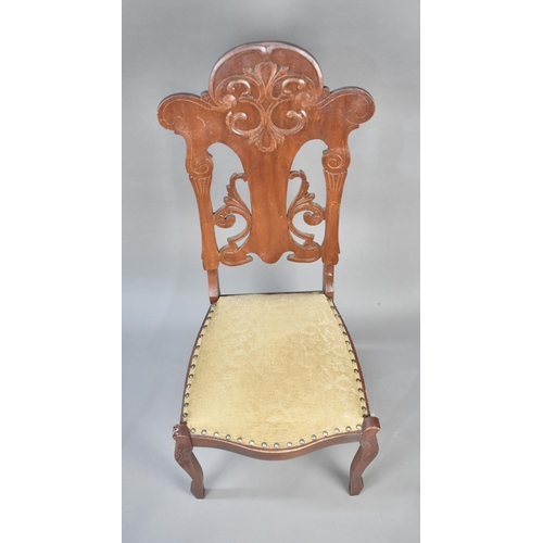 75 - A Continental Side Chair with Pierced and Moulded Back, Serpentine Front and Cabriole Front Legs