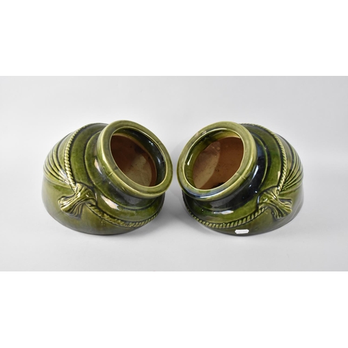 78 - A Pair of Green Glazed Stoneware Planters in the Form of Buried Amphora Vases, 26cms Wide