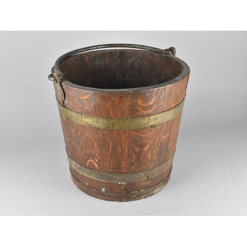 85 - A 19th Century Brass Banded Coopered Oak Bucket with Steel Hoop Handle, 33cms Diameter and 31cms Hig... 