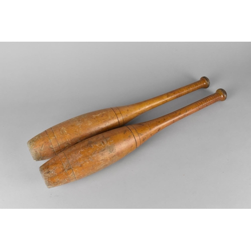 86 - A Pair of Late Victorian/Edwardian Exercise Clubs, 48cms Long