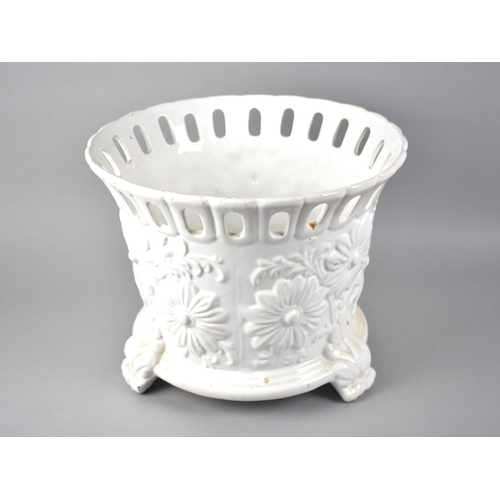 90 - A Circular White Glazed Jardinière, The Relief Body Decorated with Flowers, Pierced Rim, 34cms Diame... 