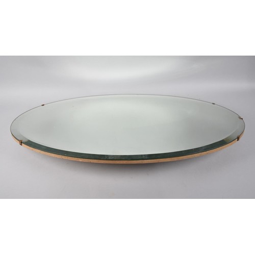 243 - A Vintage Oval Bevel Edged Wall Mirror, 73cms Wide