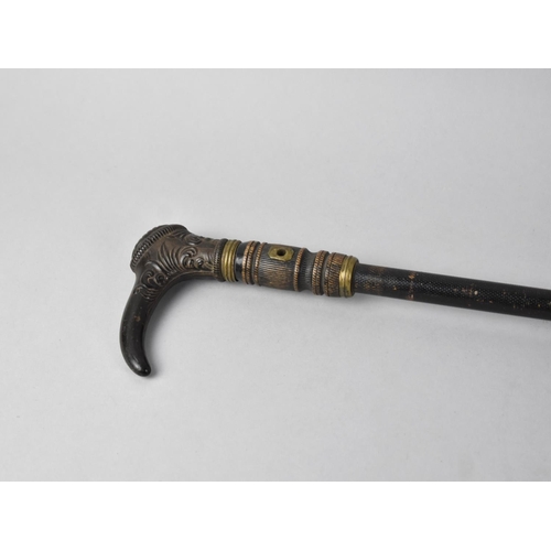 1 - An Interesting 19th Century Ladies Riding Crop with Carved Handle and Leather Covered Shaft, 80cms L... 
