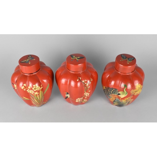 125 - A Set of Three Oriental Lacquered Lidded Lobed Ginger Jars Decorated with Flowers, Insects and Birds... 