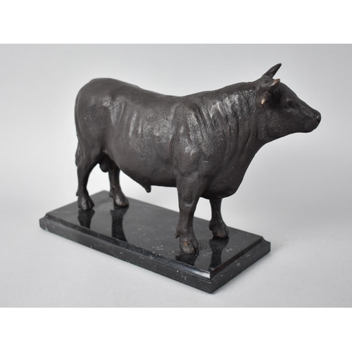 28 - A Reproduction Patinated Bronze Study of a Continental Bull on Marble Plinth, 24cms Long
