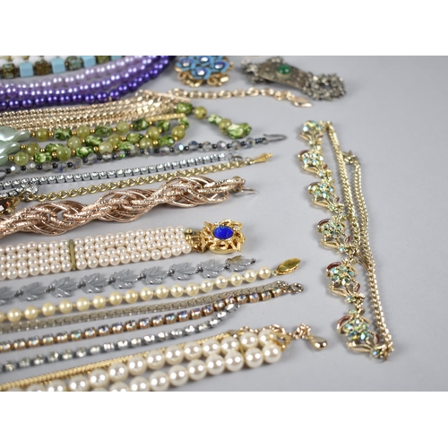 322 - A Collection of Various Costume Jewellery to include Chanis, Faux Pearls, Boxed Skylite Lighter Etc