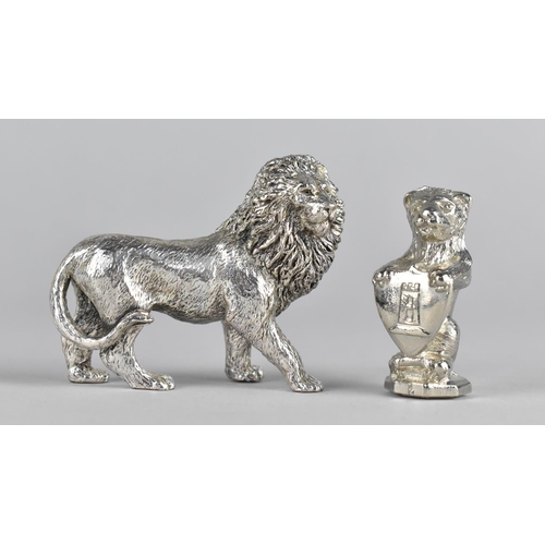 33 - Two Modern Chromed Lions, One in the Form of a Seal Monogrammed V, 5cms High