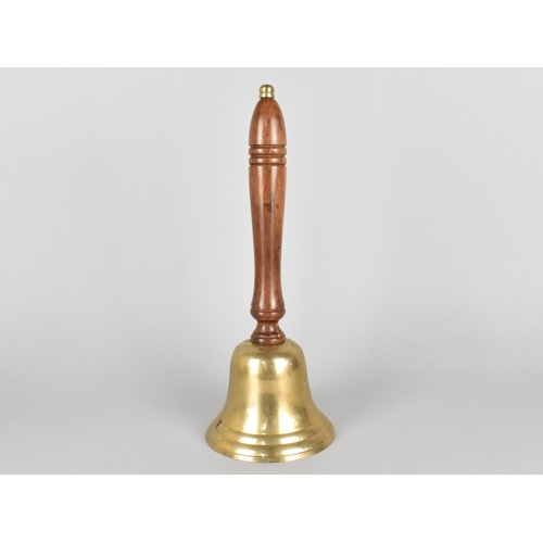 38 - A Modern Brass Bell with Turned Wooden Handle, 30cms High