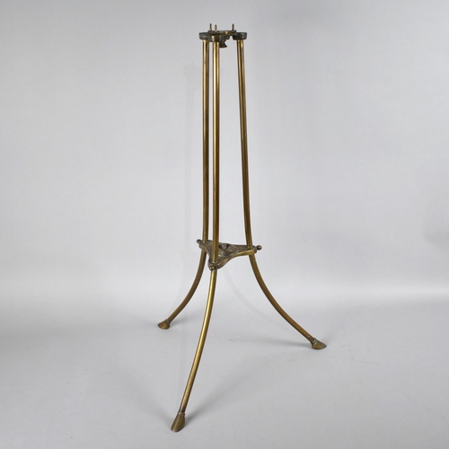 55 - A Late 19th Century Brass Tripod Stand with Swivel Top and Hoof Feet, 64cms High