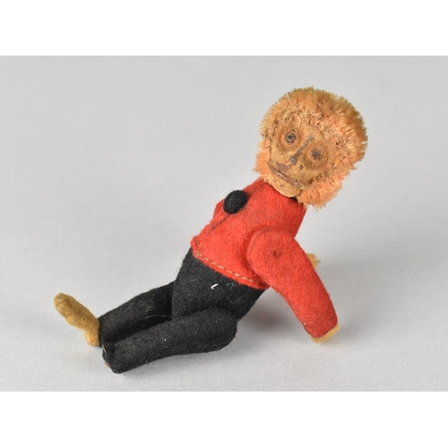 56 - An Early/Mid 20th Century Monkey Scent Bottle with Plush Hair and Articulated Body Dressed in Red Tu... 
