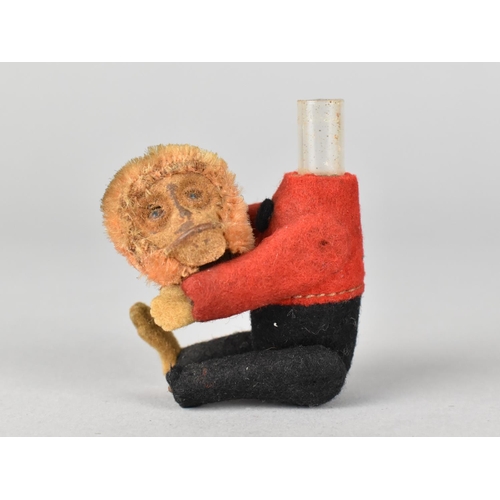 56 - An Early/Mid 20th Century Monkey Scent Bottle with Plush Hair and Articulated Body Dressed in Red Tu... 