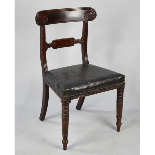 587 - A Late 19th Century Mahogany Framed Chair with Carved Back on Turned Front Supports and Leather Upho... 