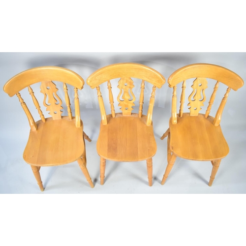 588 - A Set of Three Modern Pine Kitchen Chairs