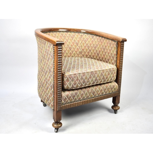 590 - An Edwardian Oak Framed Tub Armchair