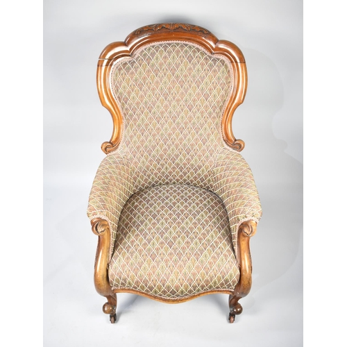 591 - A Victorian Mahogany Framed Ladies Armchair on Claw and Ball Feet Culminating to Casters, Later Upho... 