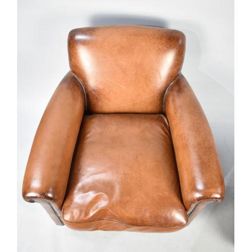 592 - A 'Burlington'  Armchair in Tan Leather with Matching Footstool