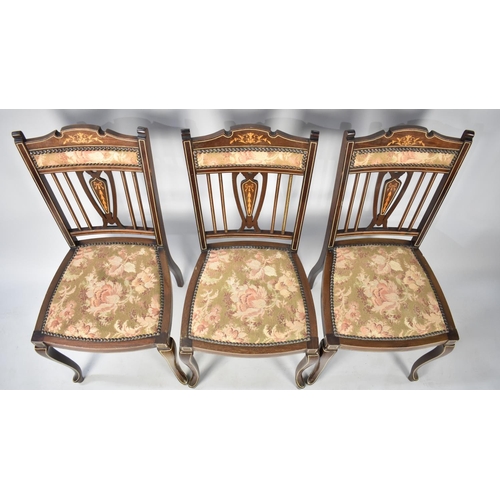 608 - An Edwardian Inlaid Salon Suite of Six Chairs to include Two Carvers