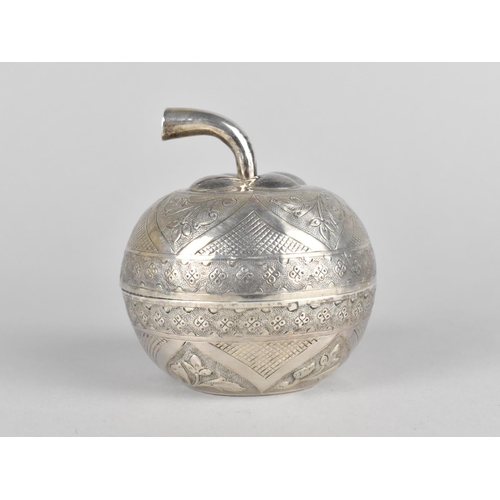 63 - An Indian White Metal Novelty Tea Caddy in the Form of a Carved and Decorated Fruit, 8.5cms High