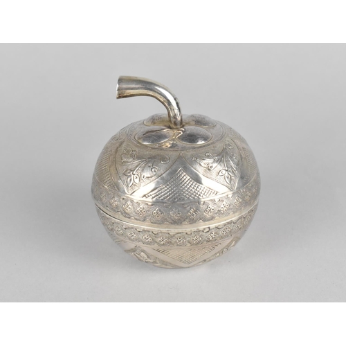 63 - An Indian White Metal Novelty Tea Caddy in the Form of a Carved and Decorated Fruit, 8.5cms High