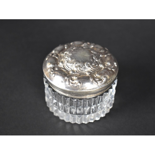 65 - A Sterling Silver Topped Glass Dressing table Pot, 6cms Diameter and 5cms High