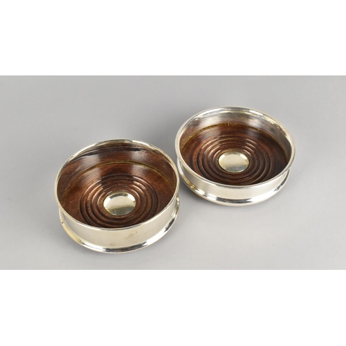 70 - Two Reproduction Silver Plated Circular Bottle Coasters, 12.5cms Diameter