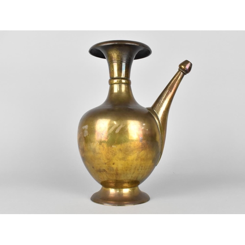 74 - A Large Heavy Bronze Islamic Ewer, 25cms High