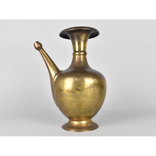 74 - A Large Heavy Bronze Islamic Ewer, 25cms High