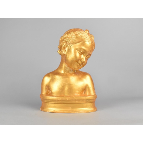 79 - A Heavy Cast Resin Gilt Painted Bust of a Young Girl, 24.5cms High