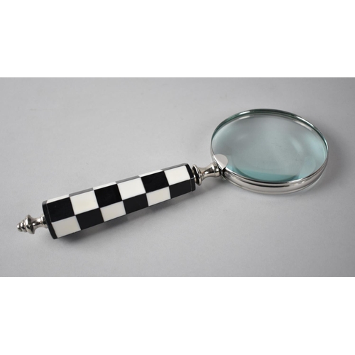 8 - A Modern Large Chrome and Chequered Grip Magnifying Glass, 27cms Long