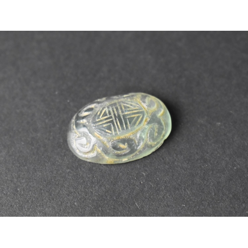 486 - A Chinese Rock Crystal Oval Carving with Archaic Design and Scroll Border, 3cm