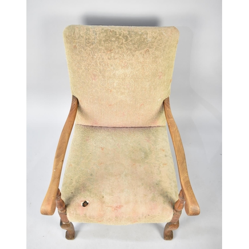 561 - A Mid 20th Century Armchair for Upholstery