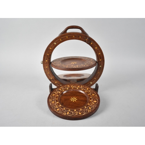 105 - A Novelty Inlaid Circular Three Tier Stand which Folds up to a 21cms Circle