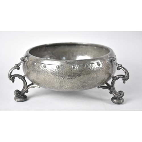 106 - A Hand Beaten Three Legged Pewter Fruit Bowl c.1920 by Mayflower, 22cms Diameter