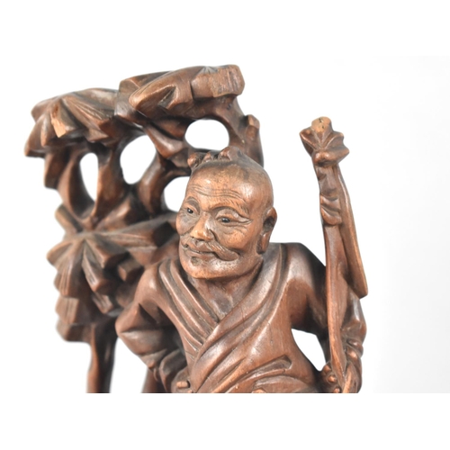 112 - A Chinese Carved Root Wood Figure Group, Immortal and Attendant under Tree, 26cms High