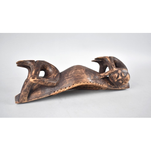 113 - A Carved African Tribal Bowl in the Form of Two Seated Figures Carrying Canoe on Shoulders, 34cms Wi... 