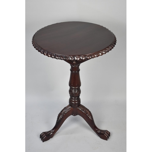 119 - A Reproduction Mahogany Snap Top Tripod Table with Claw Feet, 49cms Diameter